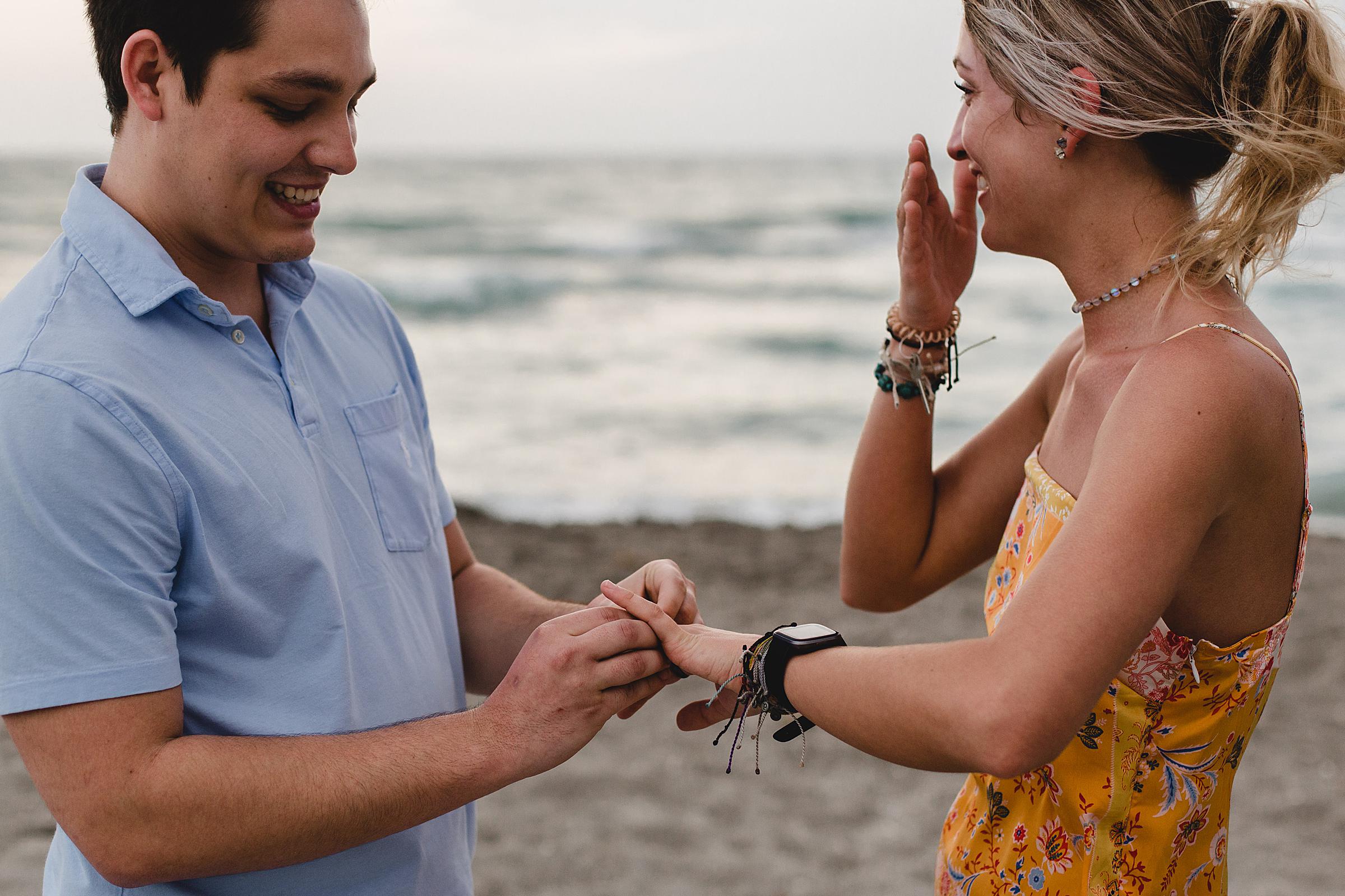 surprise proposal at turtle beach, proposal on siesta key beach, sarasota proposal photographer