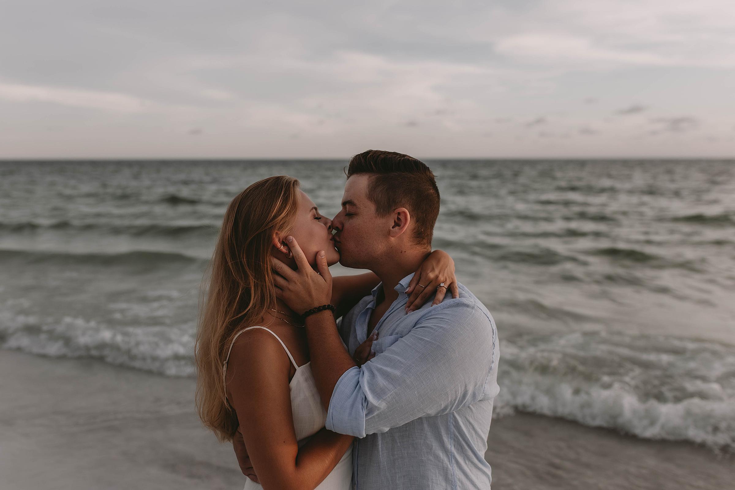 Couples Portraits after getting engaged on Longboat Key Beach