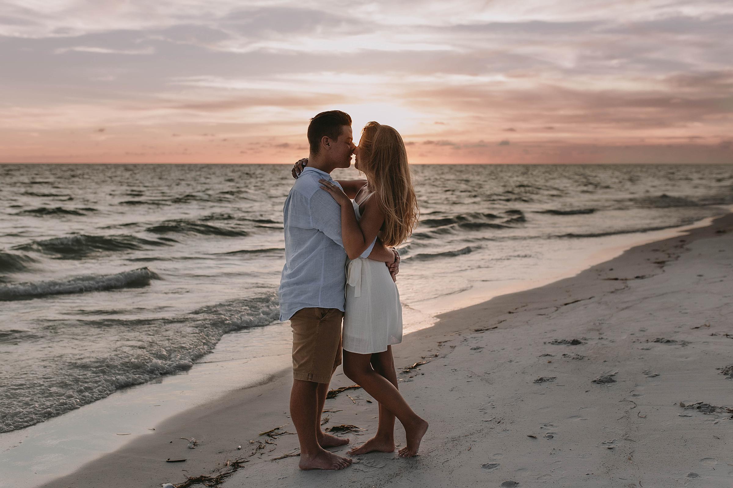 Couples Portraits after getting engaged on Longboat Key Beach