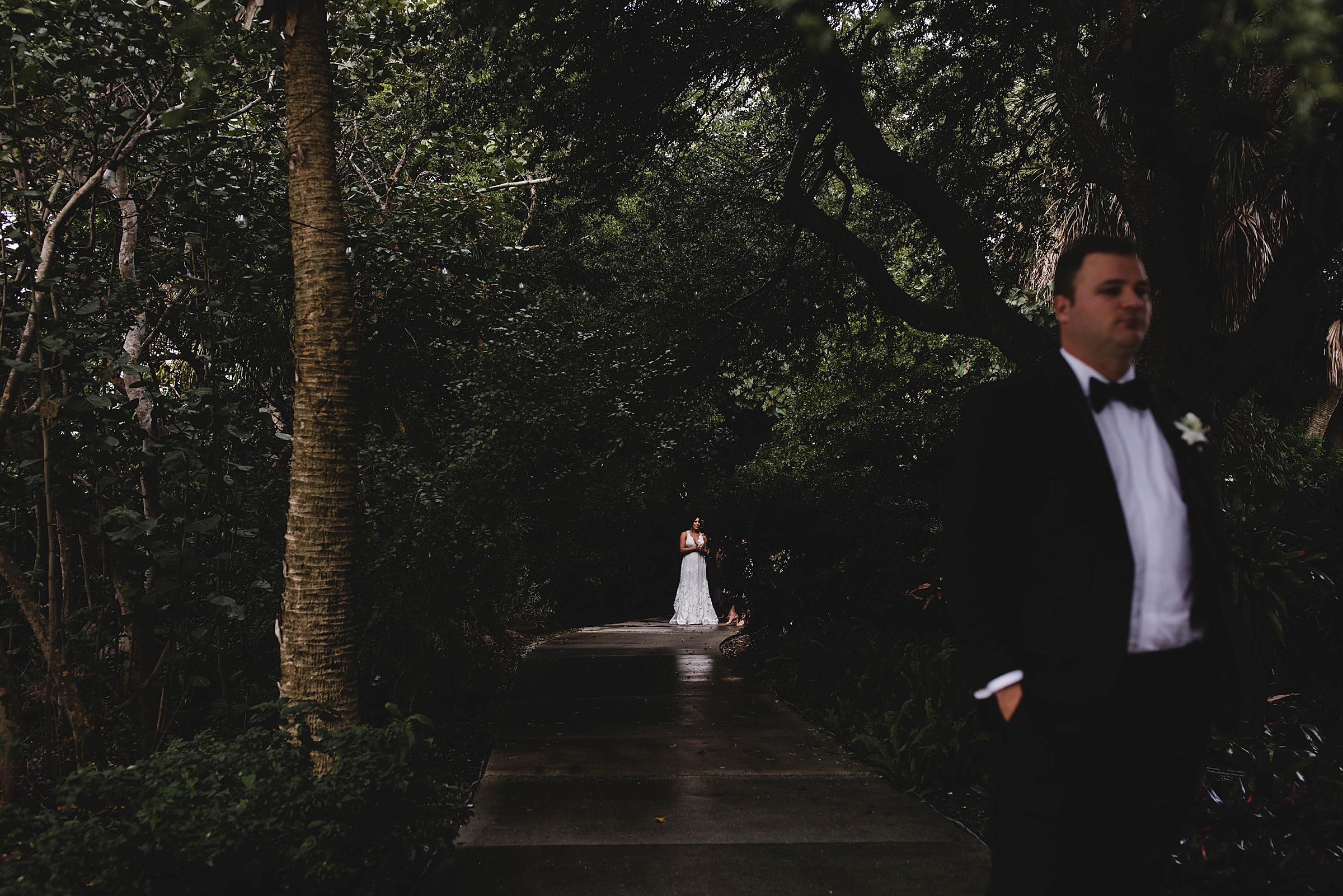 bride and groom having their first look at selby gardens wedding