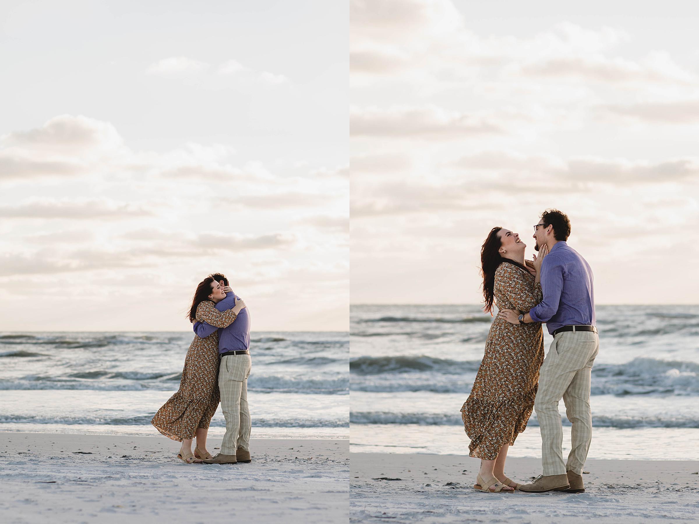 Couple embracing and laughing after surprise proposal on Lido Beach in Sarasota Florida, juliana montane photography, sarasota proposal photographer