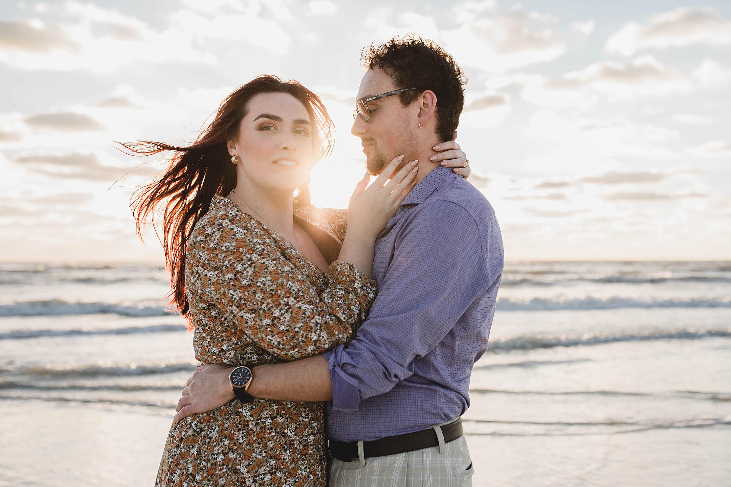 couple on Lido beach before sunset after getting engaged, juliana montane photography, sarasota proposal photographer
