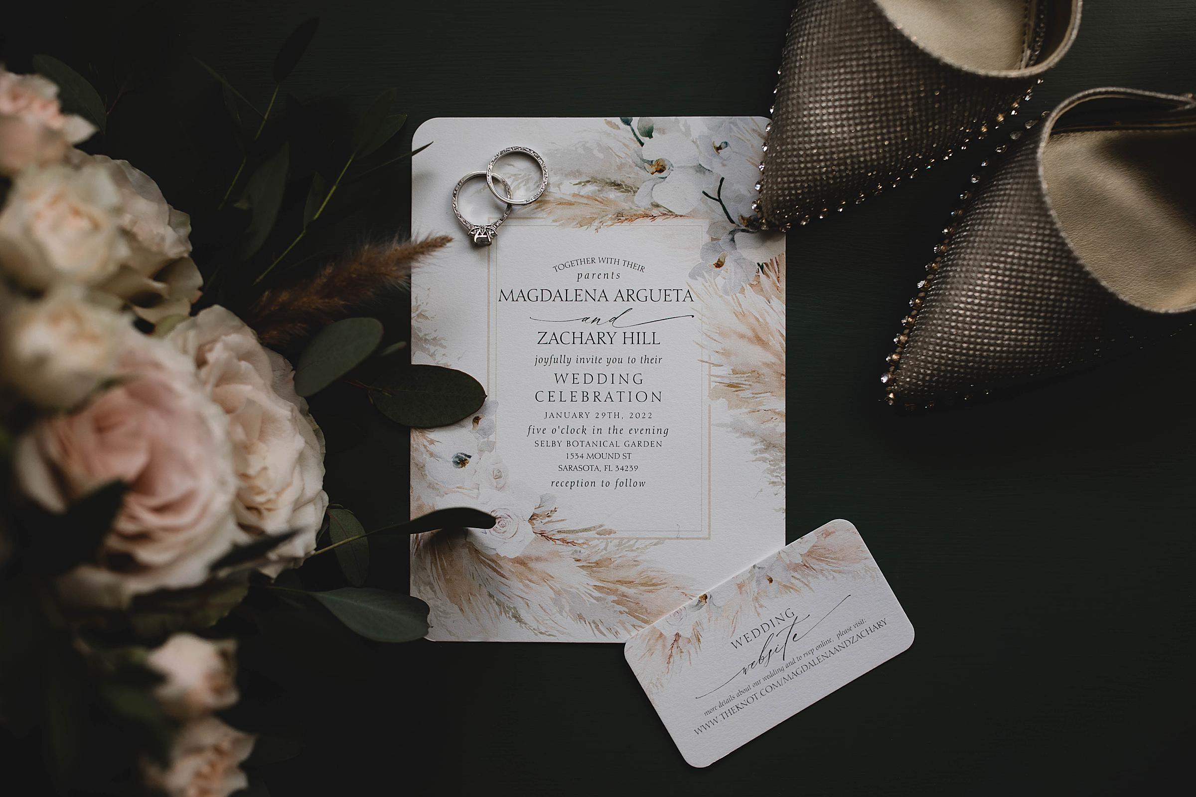 invitation suite and wedding rings at selby gardens wedding, wedding details in sarasota florida, juliana montane photography
