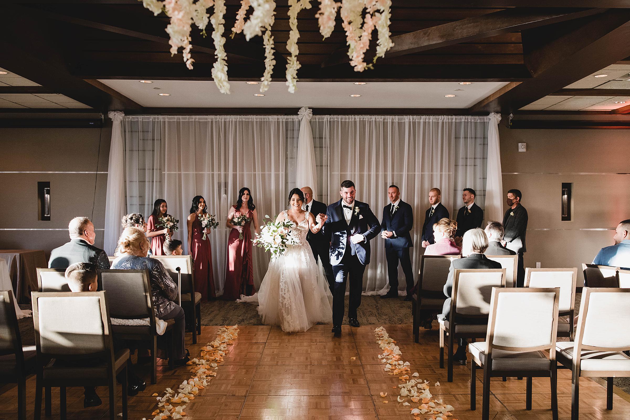 wedding ceremony inside the ballroom at Selby Gardens in Sarasota Florida, Sarasota wedding photographer