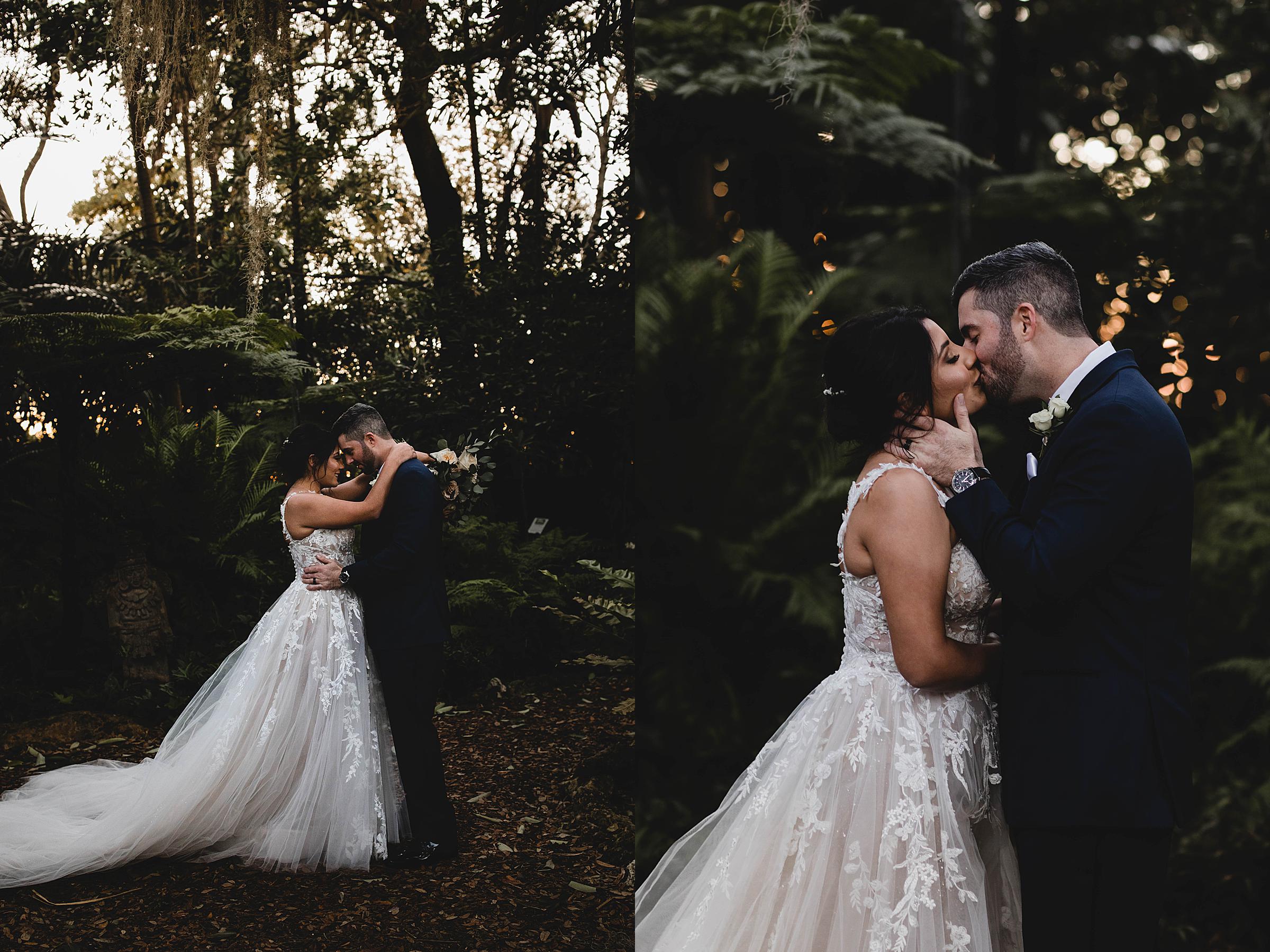 newlyweds kissing in the gardens at Selby Gardens, Selby gardens wedding photographer