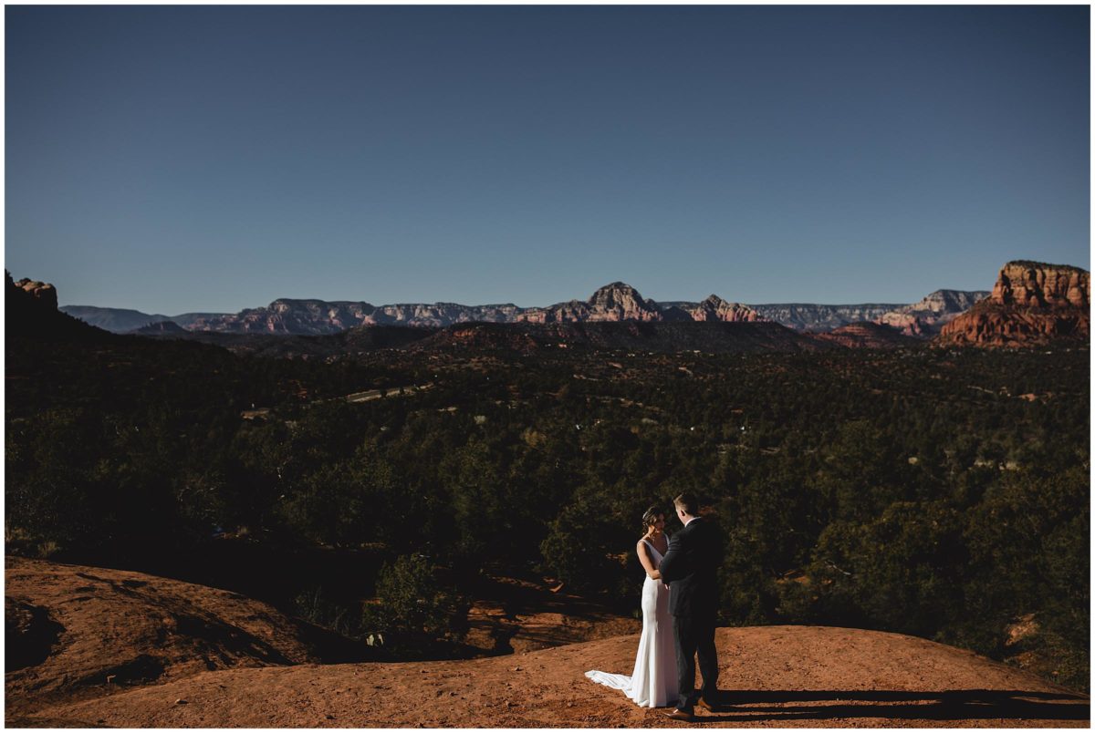 bride and groom photos at Bell Rock in sedona arizona, destination wedding in sedona, destination wedding photographer, juliana montane
