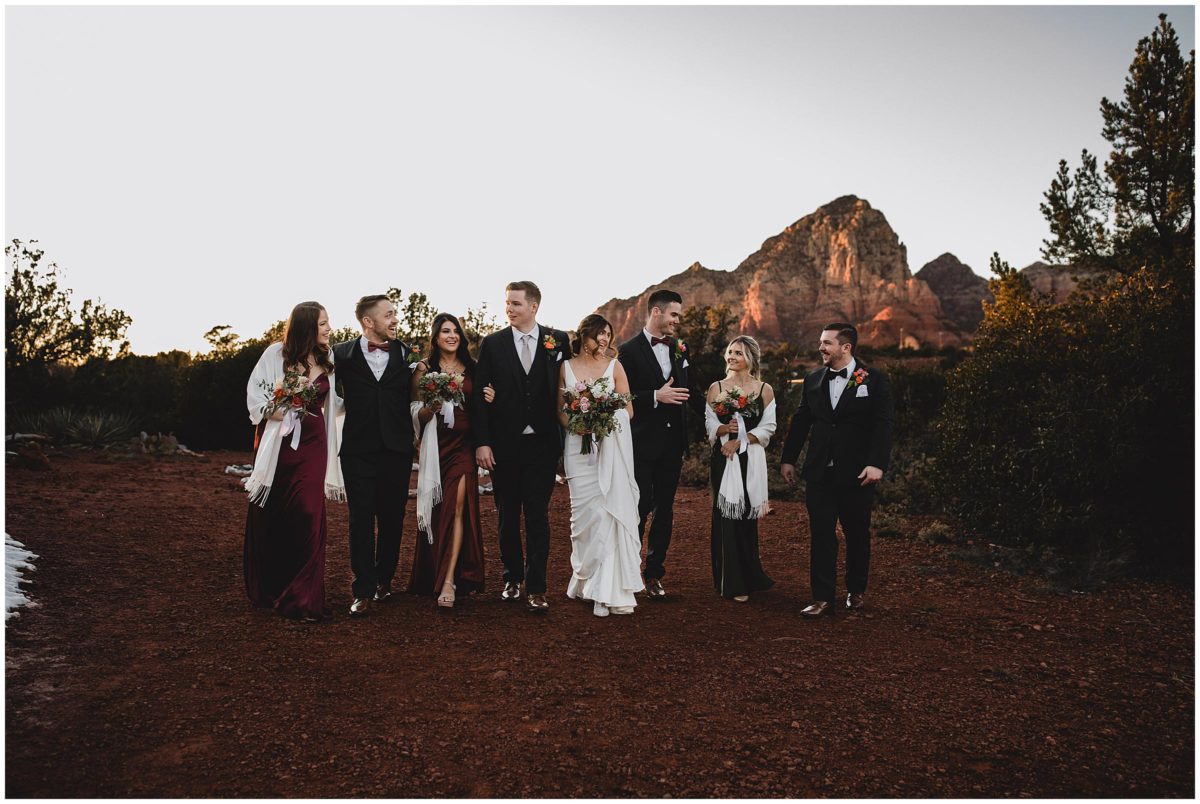 bride with bridesmaids with warm tone flower bouquets at sedona destination wedding, juliana montane photography