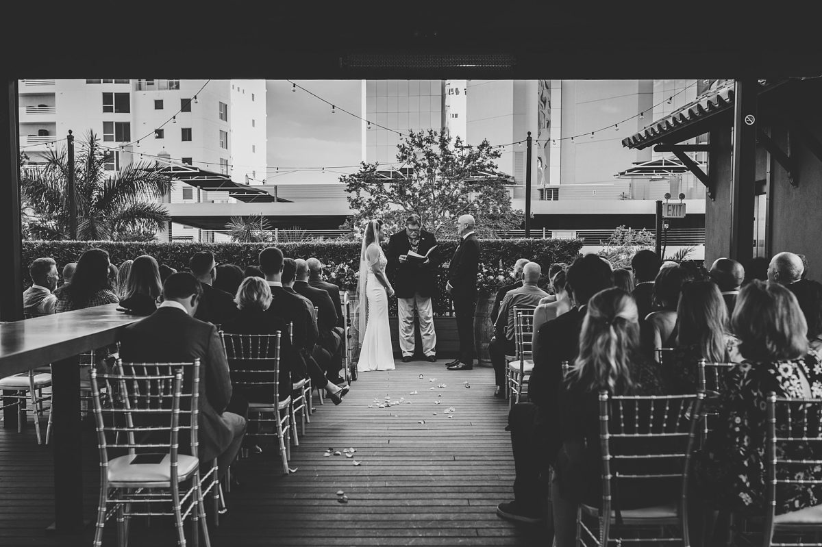 ceremony at sage restaurant in sarasota florida photographed by juliana montane photography
