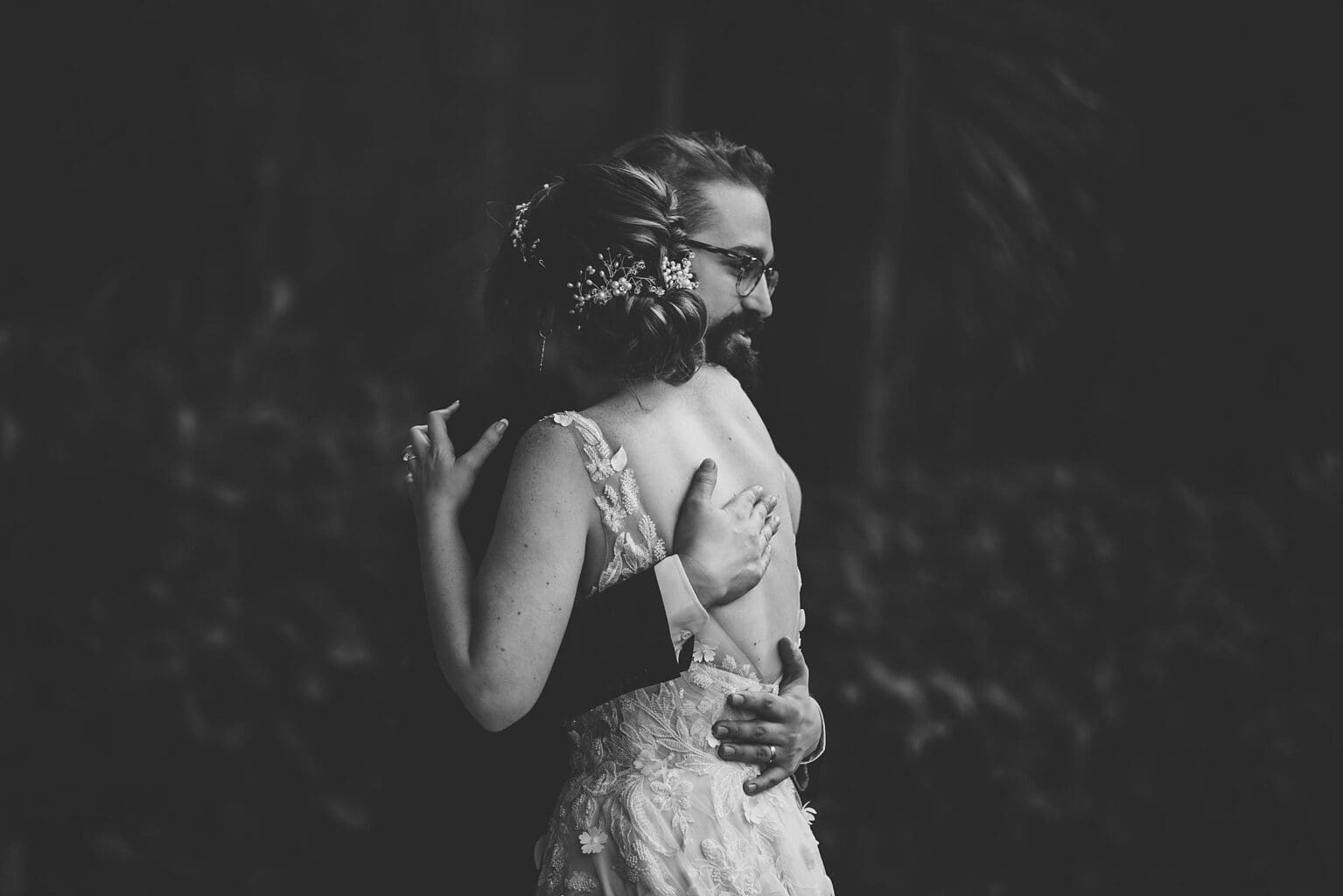 Bride & Groom embracing  at a Sunken Gardens Wedding in St. Petersburg, FL photographed by Juliana Montane Photography