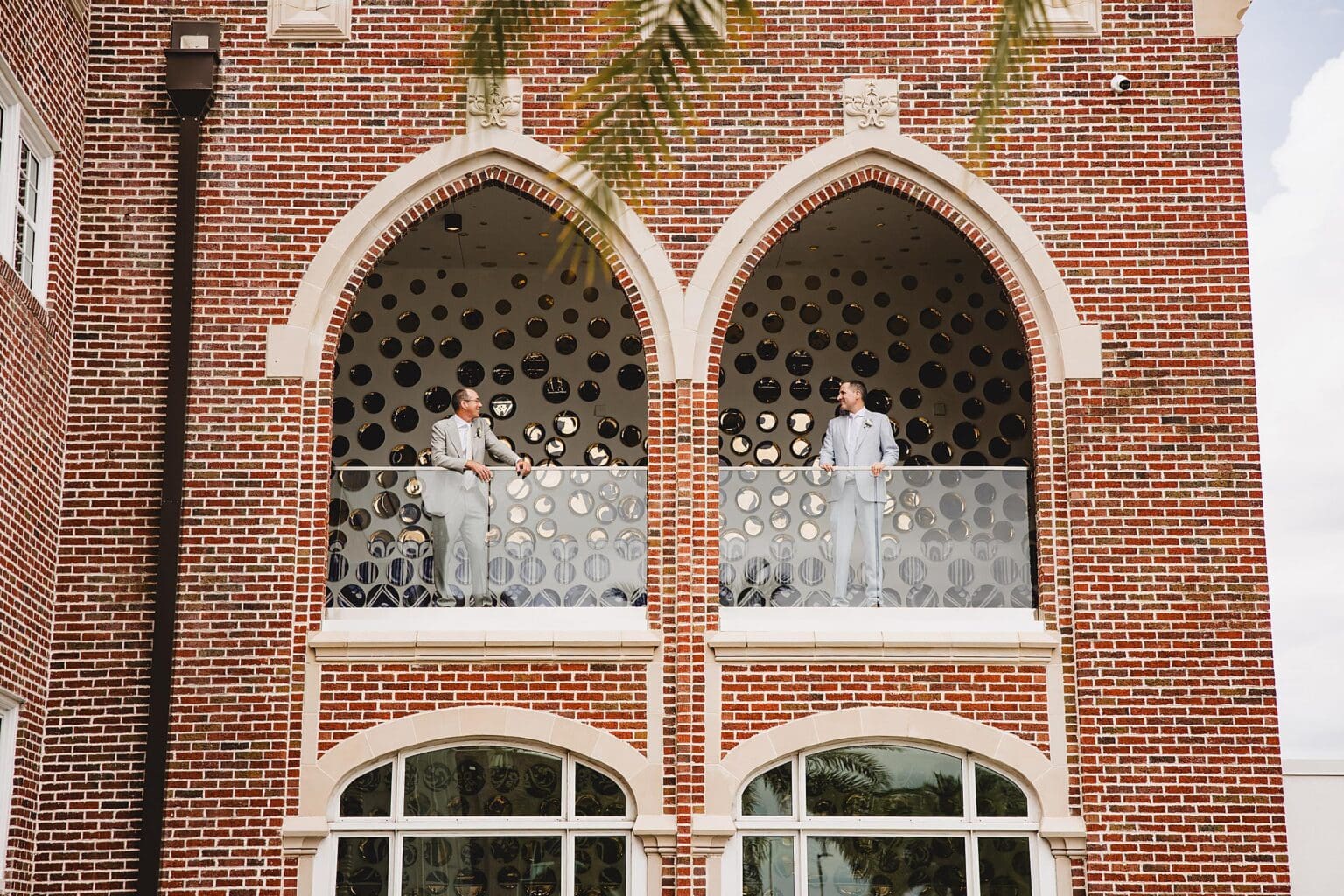 Grooms posing at their Sarasota Art Museum wedding in Sarasota Florida photographed by LGBTQ Friendly photographer, Juliana Montane Photography